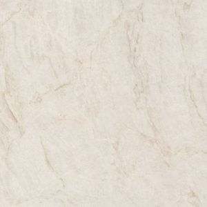 Close-up of Neolith Taj Mahal sintered stone showing luminous creamy base with subtle golden veining and quartzite texture