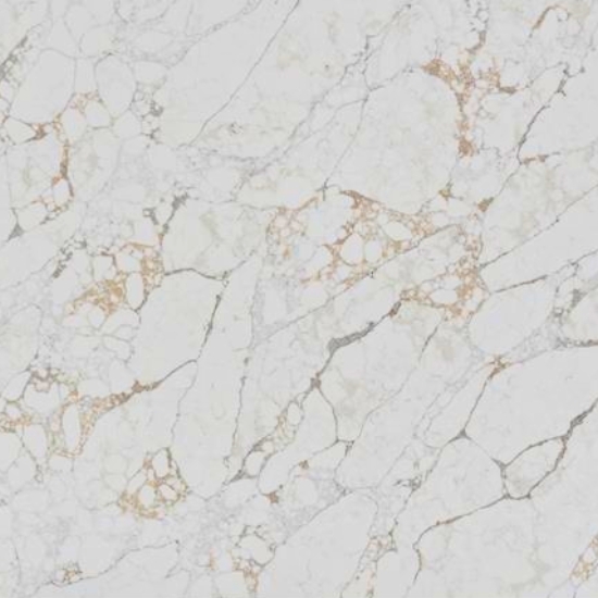 Arabescato Oro quartz kitchen worktop in white with gold and grey veins, featuring a modern sink, arched window, and decorative plants in a bright contemporary kitchen setting from the Essex Quartz Collection