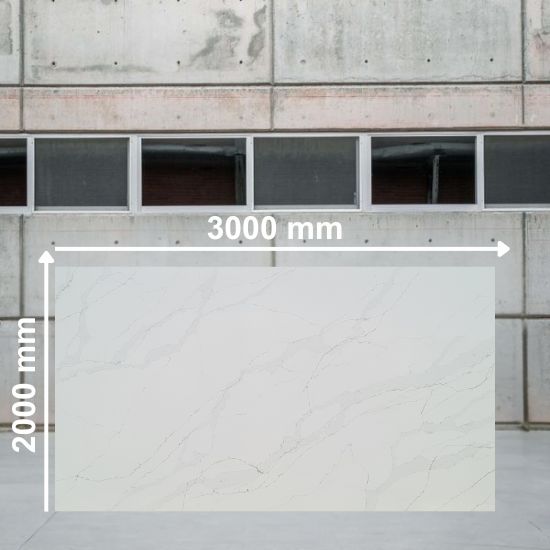 Full slab of Calacatta Gold Leather quartz measuring 3000 mm by 1600 mm, white with subtle gold grey veins, displayed in a warehouse setting