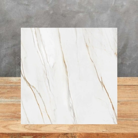 Techlam Macchia Gold square sample tile on wooden display surface