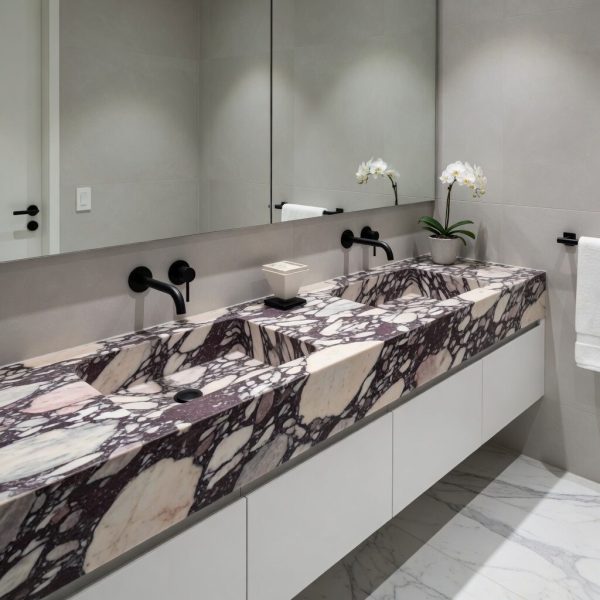 Arabescato Viola Marble bathroom vanity in dramatic purple and white breccia pattern, featuring double sinks, black matte faucets, white cabinets and white orchids in a modern luxury bathroom
