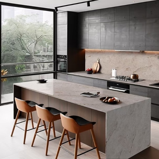 Taj Mahal Highlands Quartz kitchen island and worktops in creamy white with gold and beige veins, featuring dark grey cabinetry, bar stools and city views in a contemporary open-plan kitchen