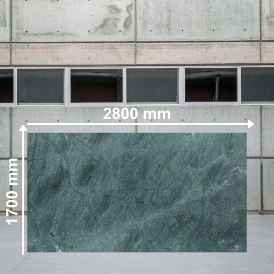 Large slab of Verde India Marble measuring 2800 mm by 1700 mm in deep emerald green with white and grey veining, displayed in warehouse setting